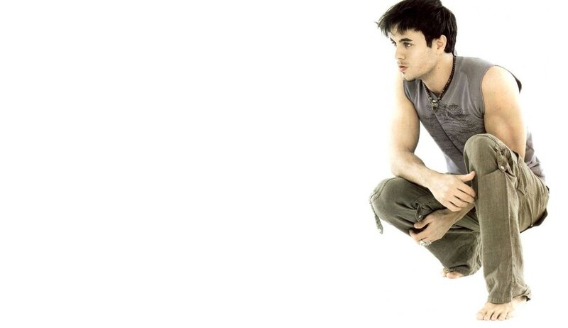 Man Crouching on White