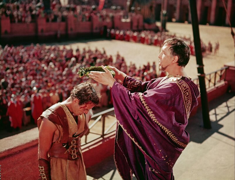 Man Crowning Another Man