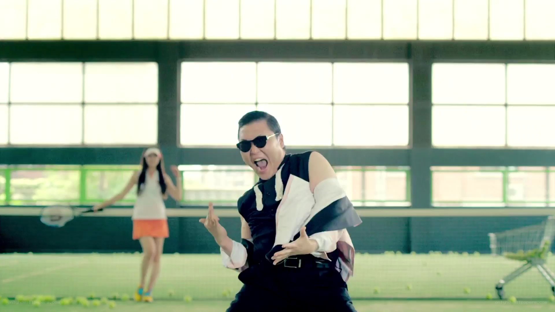 Man dancing in tennis court