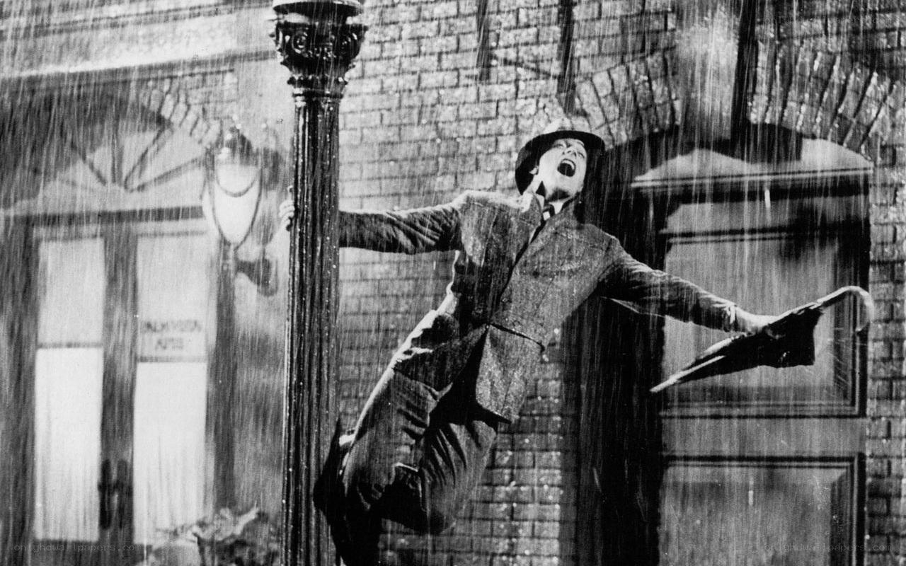 man dancing in the rain