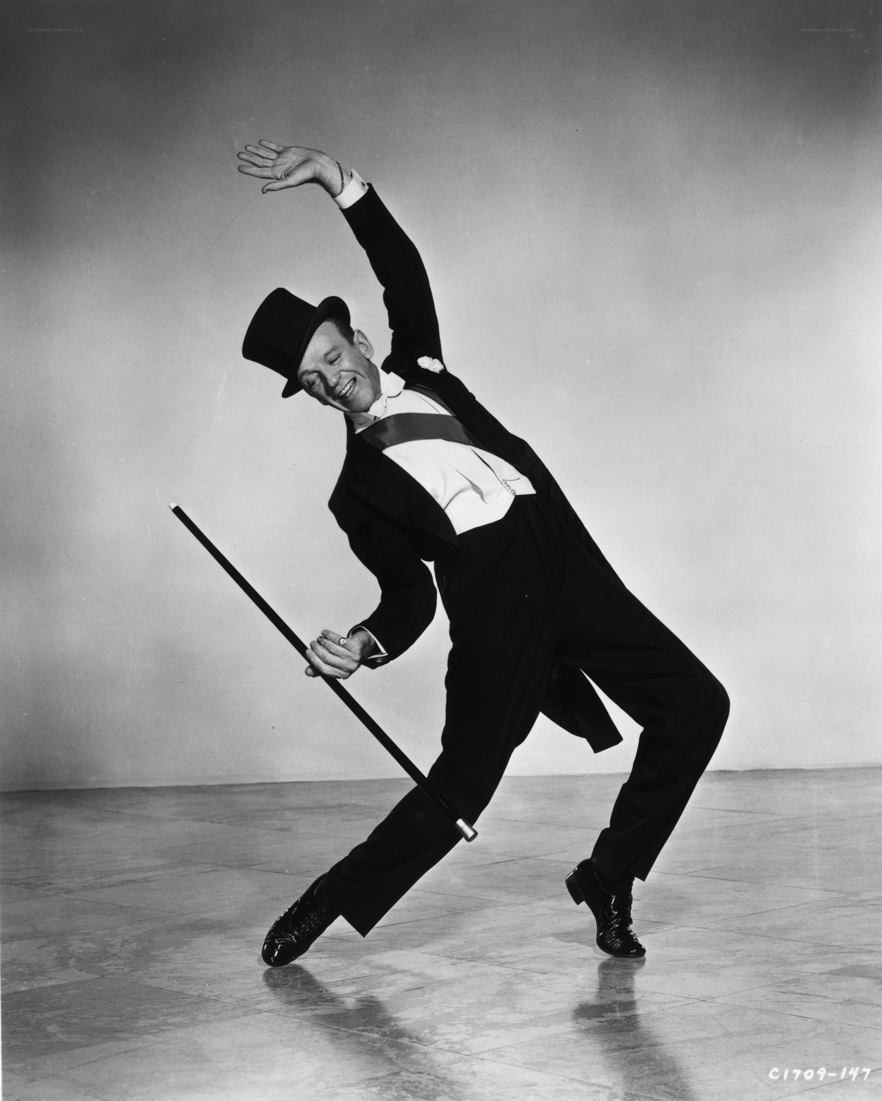 Man dancing with a cane