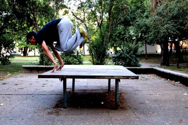 man doing acrobatic flip