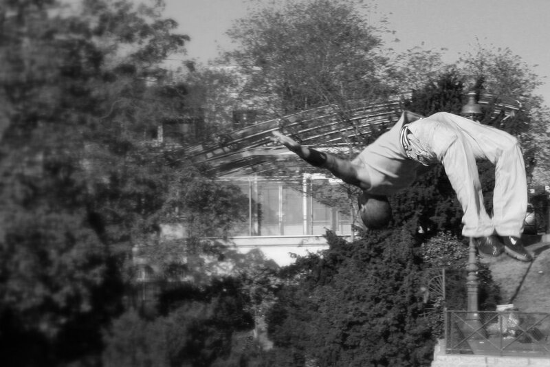 Man Doing Acrobatic Flip — Black