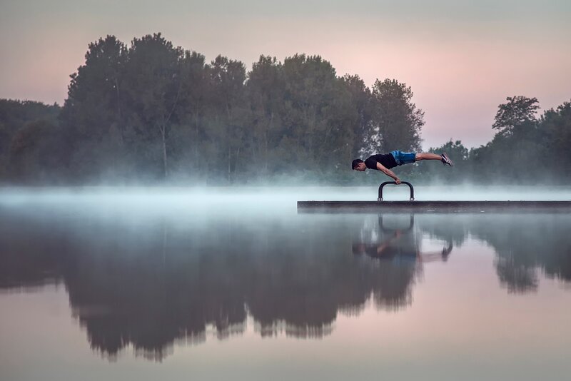 Man Doing Handstand — Blue, Serene, Morning