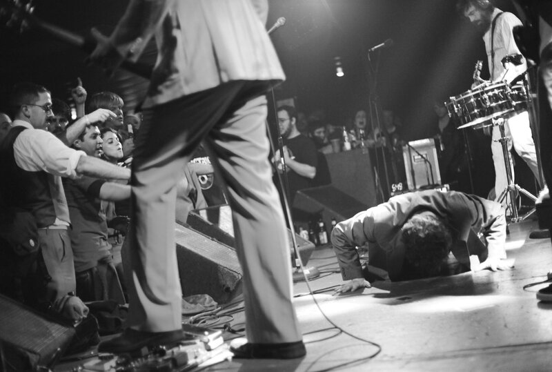 Man Doing Push-ups on Stage