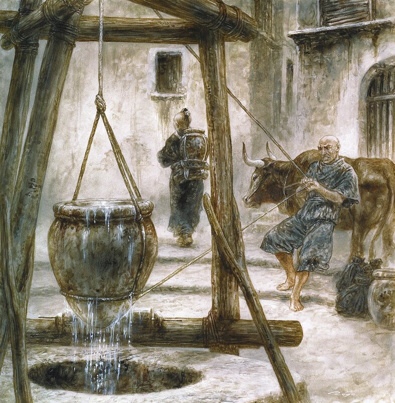 Man drawing water from a well