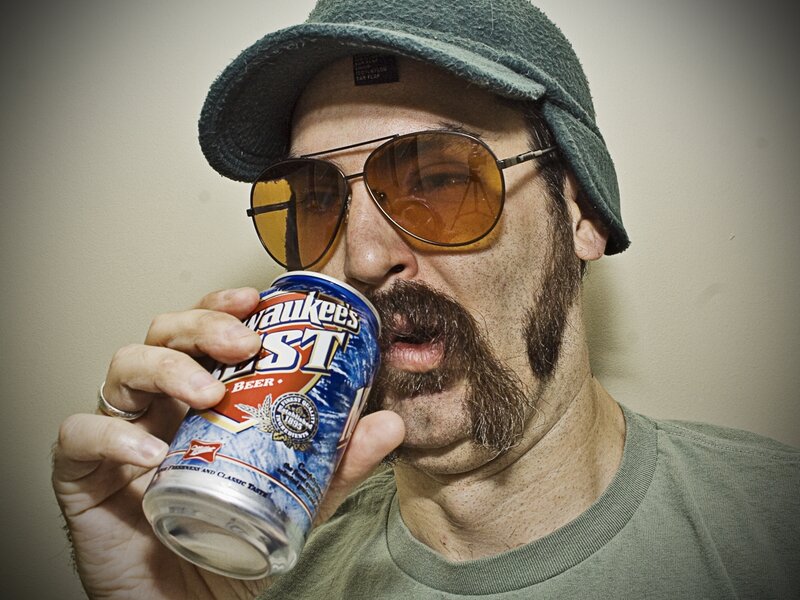 man drinking beer