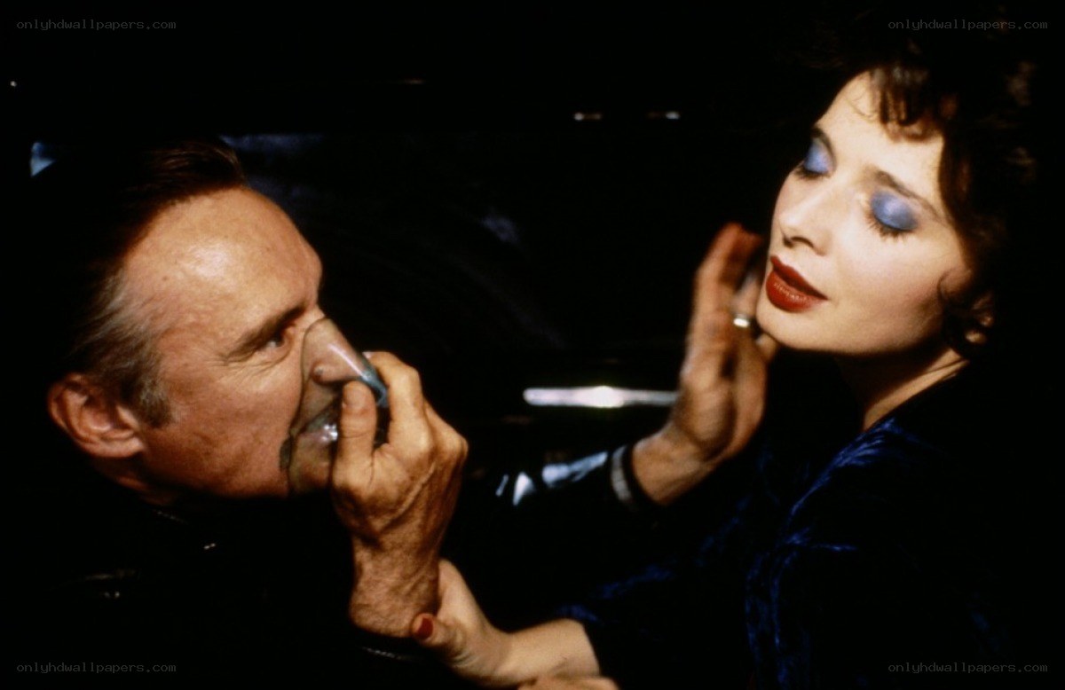 man drinking from woman's hand