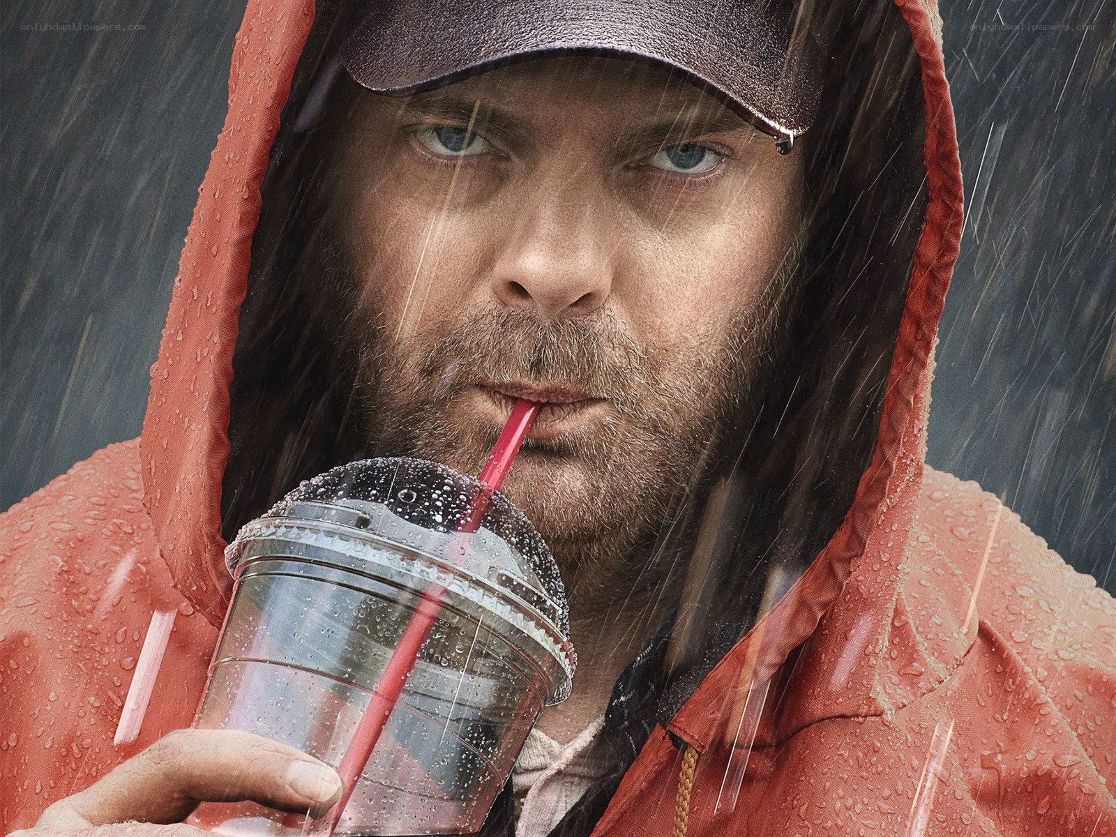 man drinking in the rain