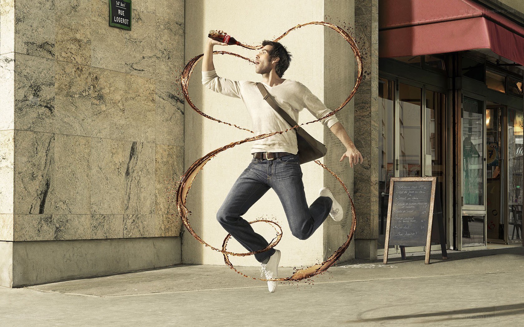 Man drinking soda in mid-air