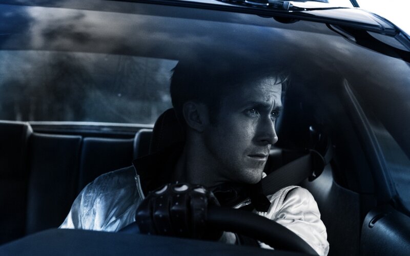 man driving a car