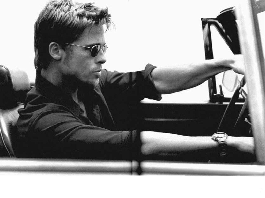 man driving a car