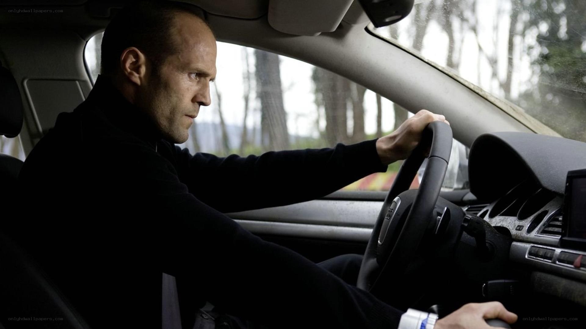 man driving a car