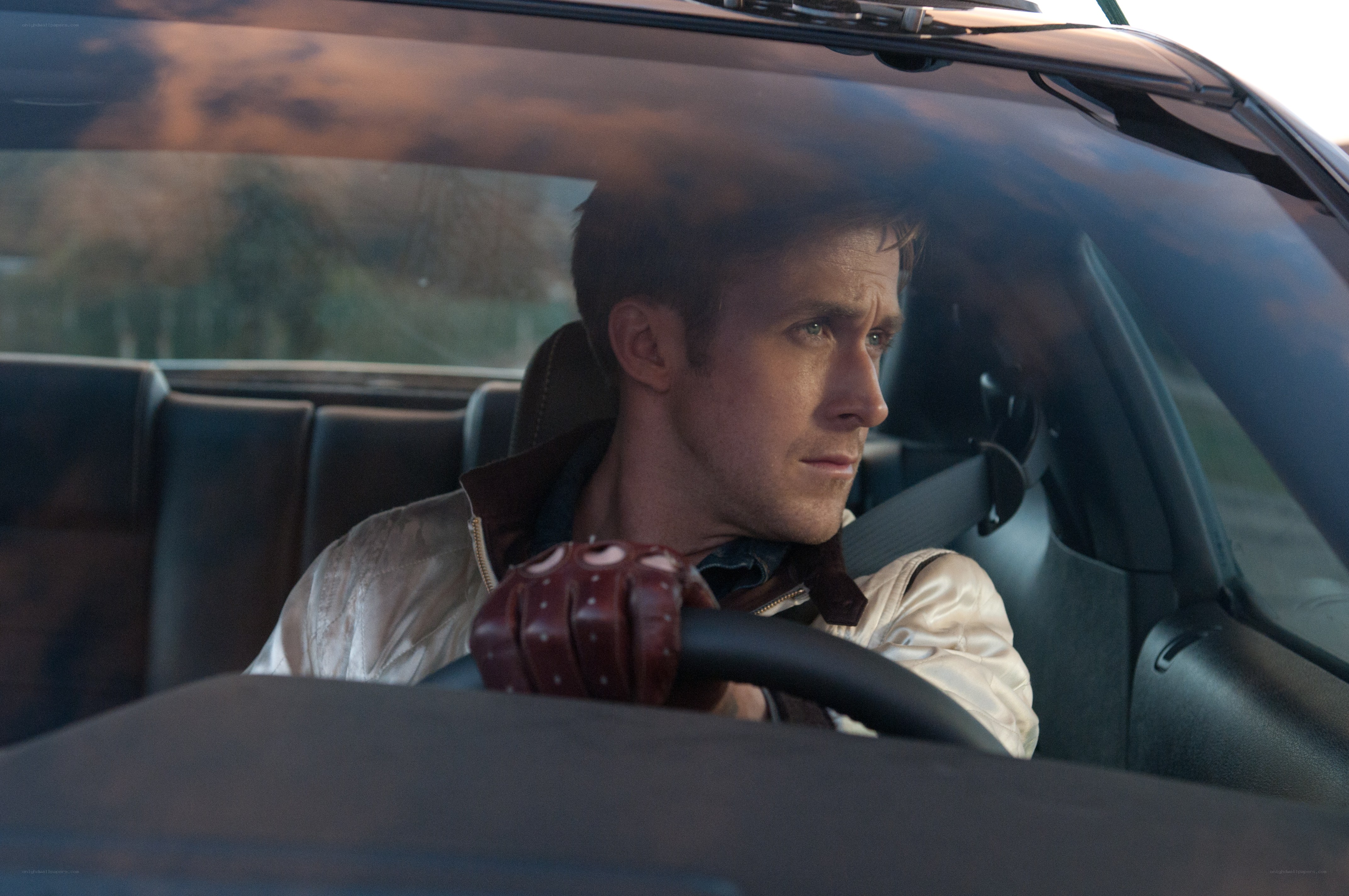 man driving a car