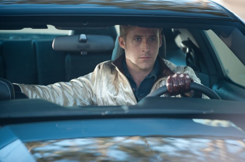 man driving a car