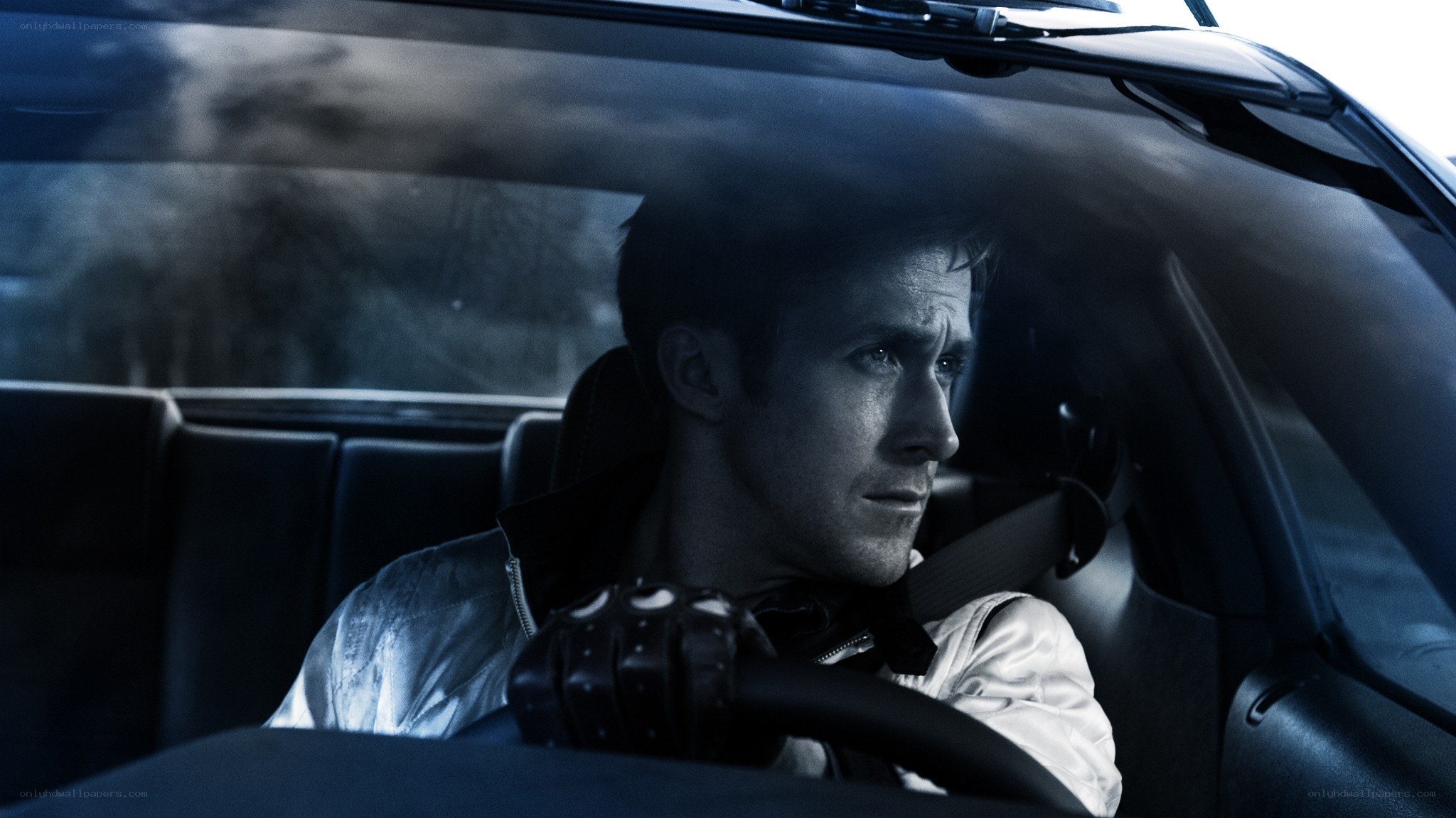 man driving a car