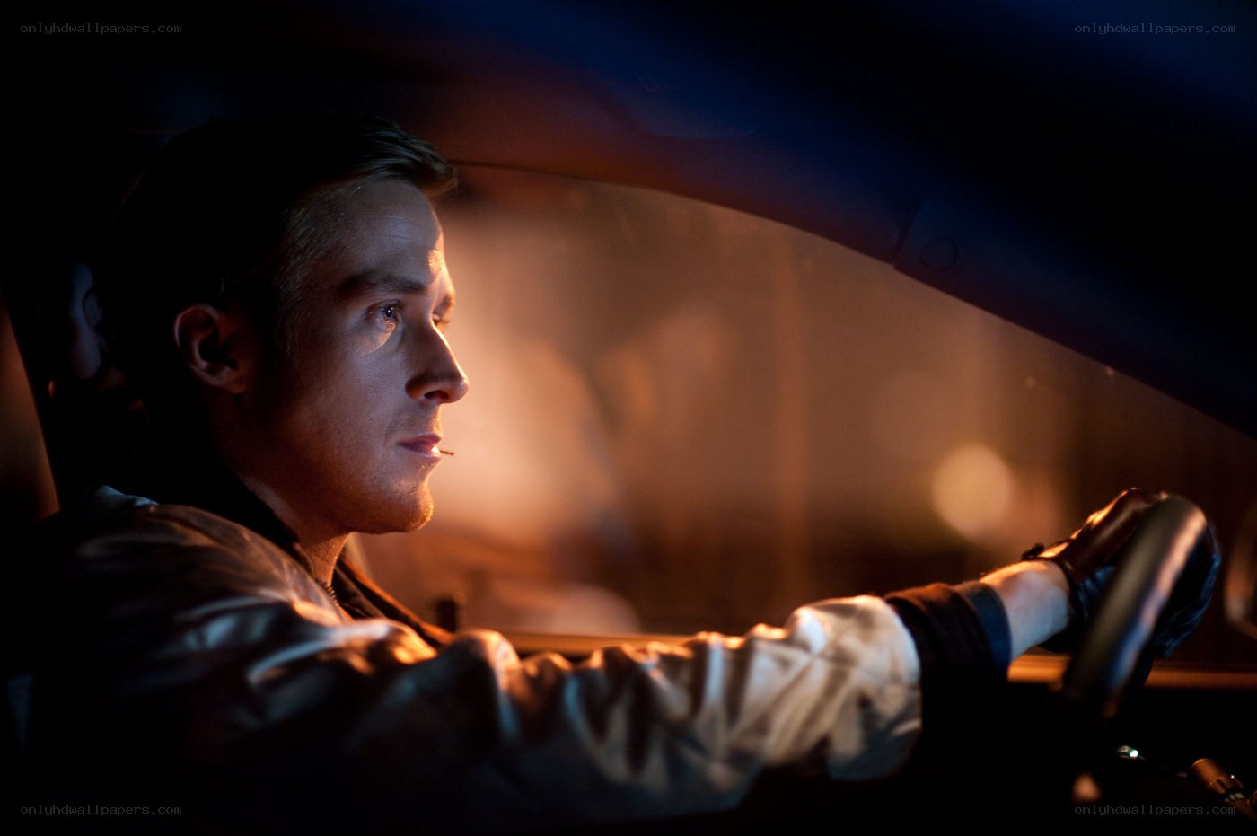 man driving at night