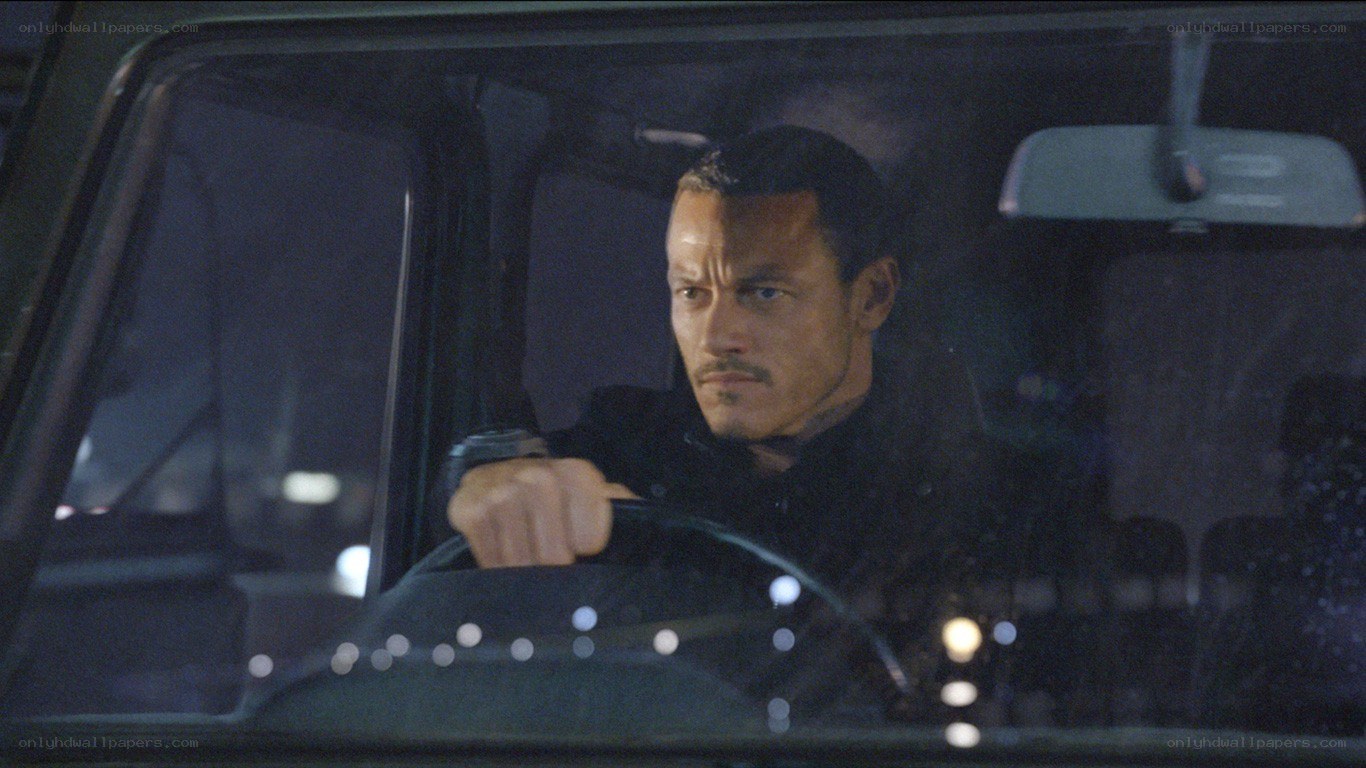 man driving at night