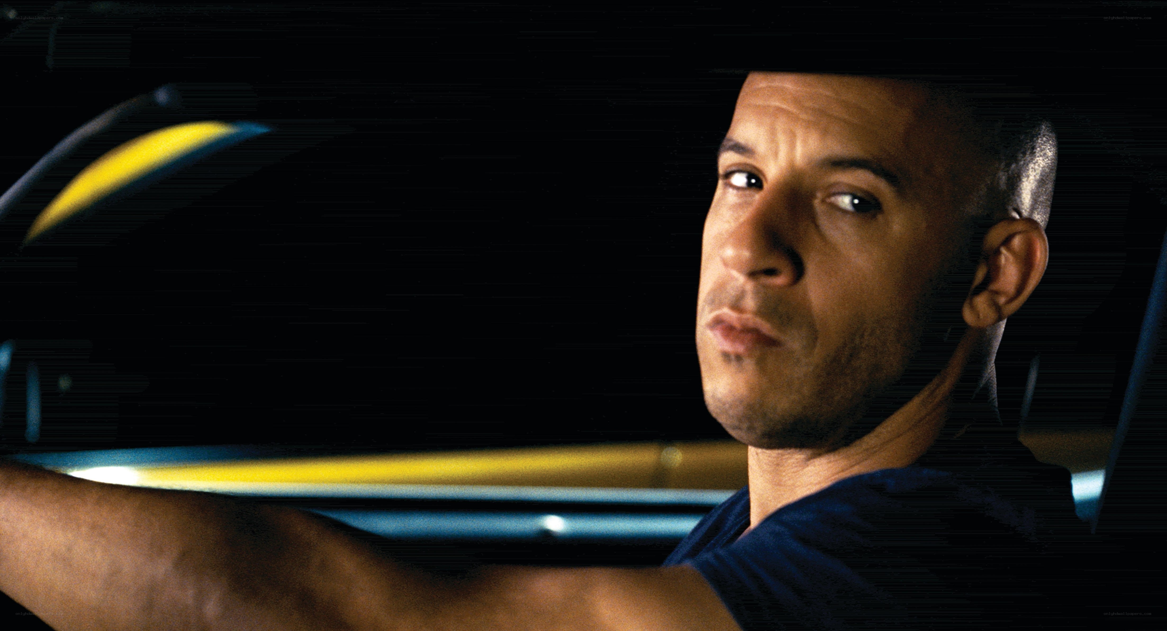 man driving car at night