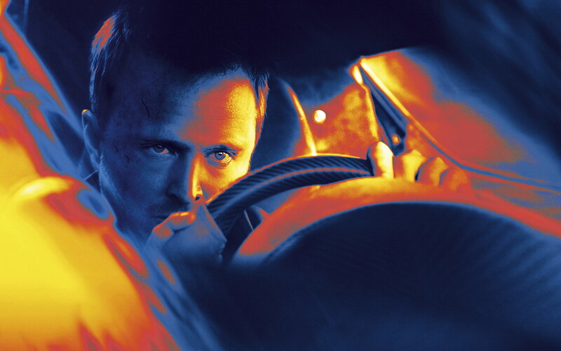 man driving car at night