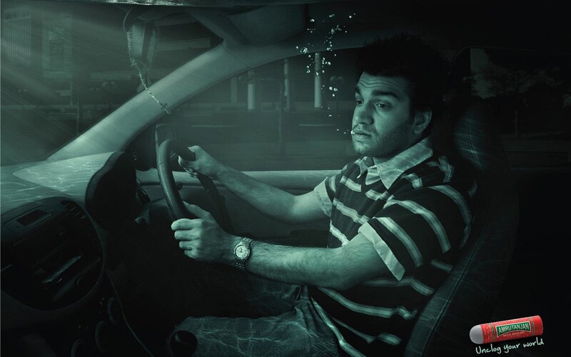 Man driving car underwater