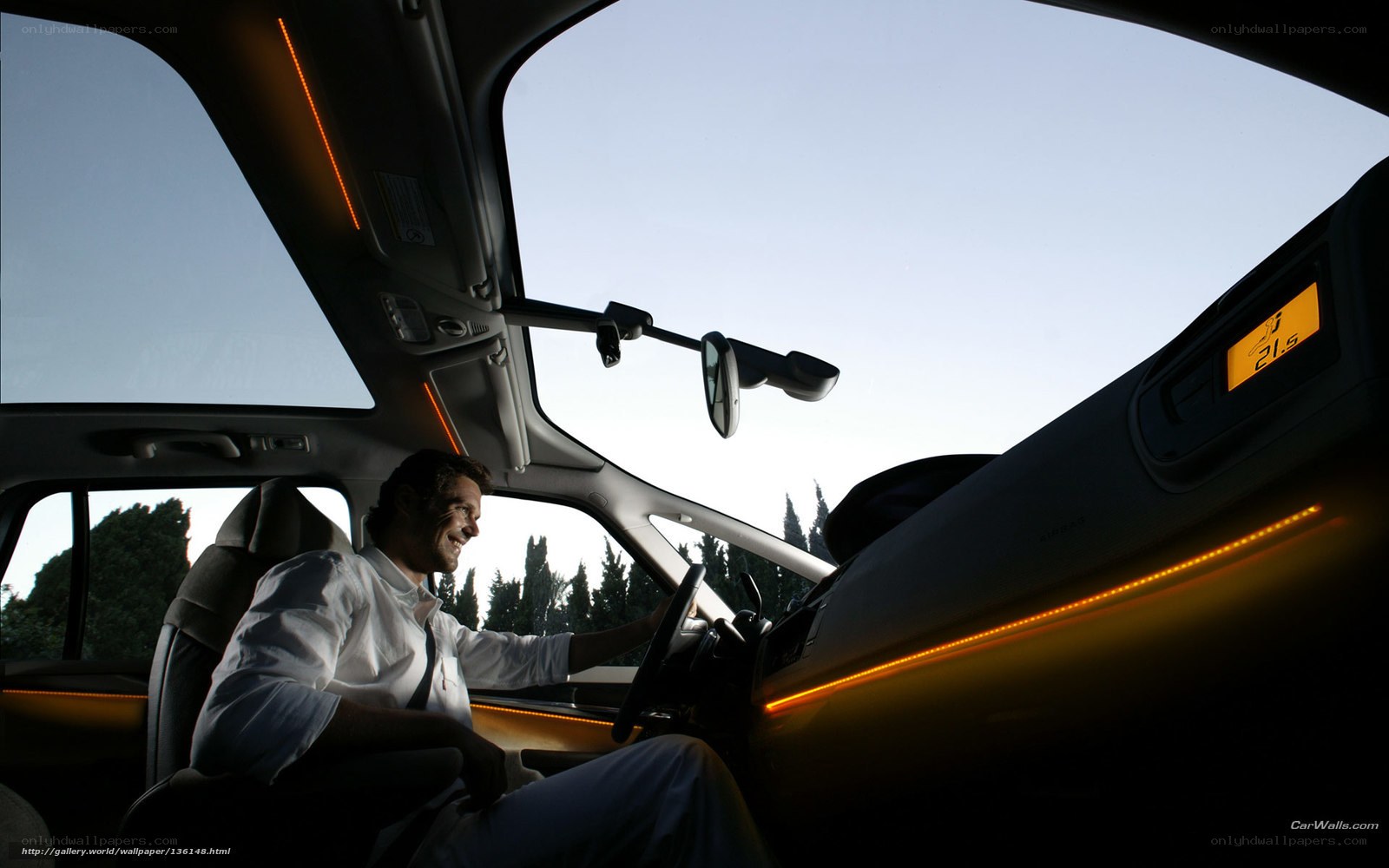 man driving car with sunroof