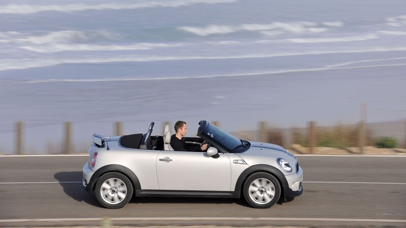 Man Driving Convertible — Silver