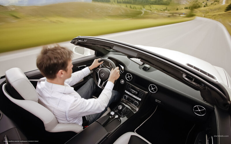 Man Driving Convertible — White