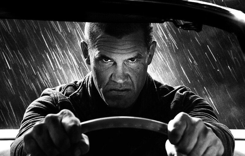 man driving in rain