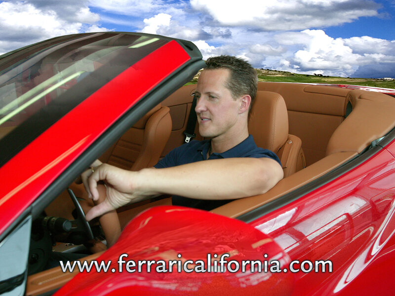 Man driving red convertible