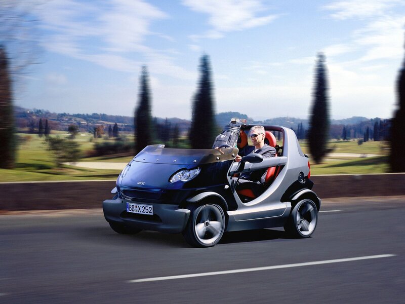 Man Driving Smart Car