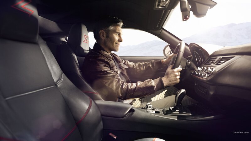 man driving sports car