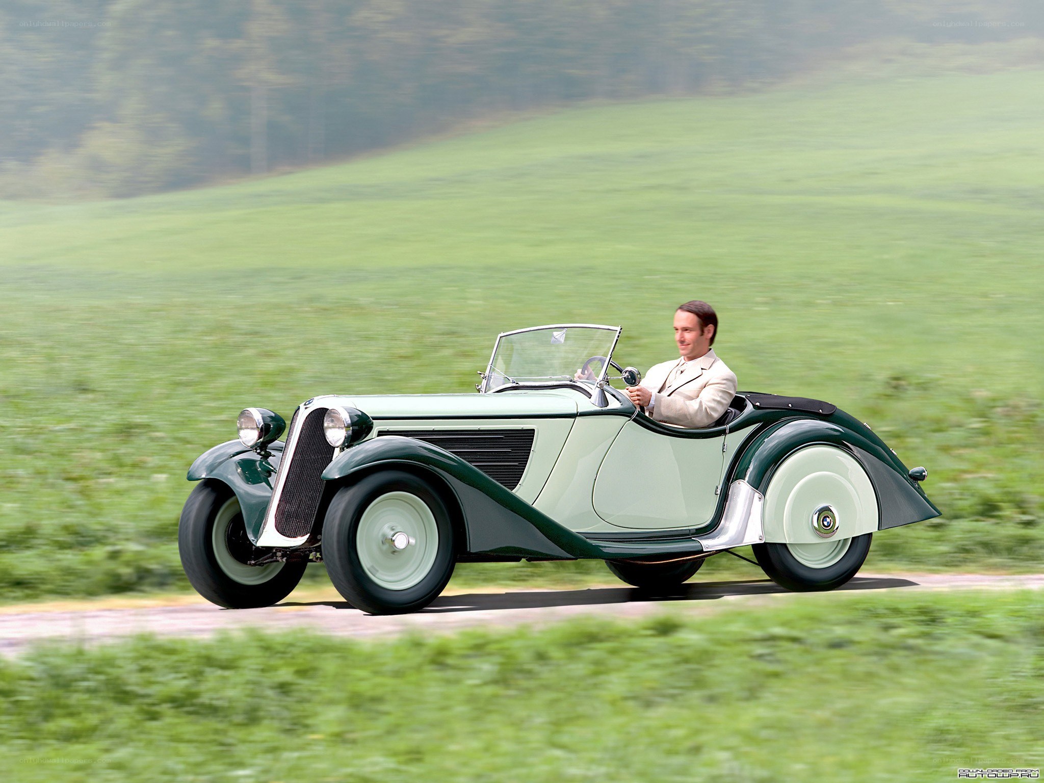 Man driving vintage car