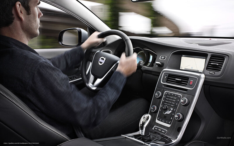 man driving volvo car