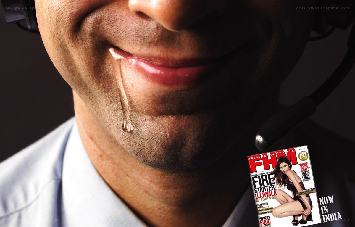 man drooling on magazine