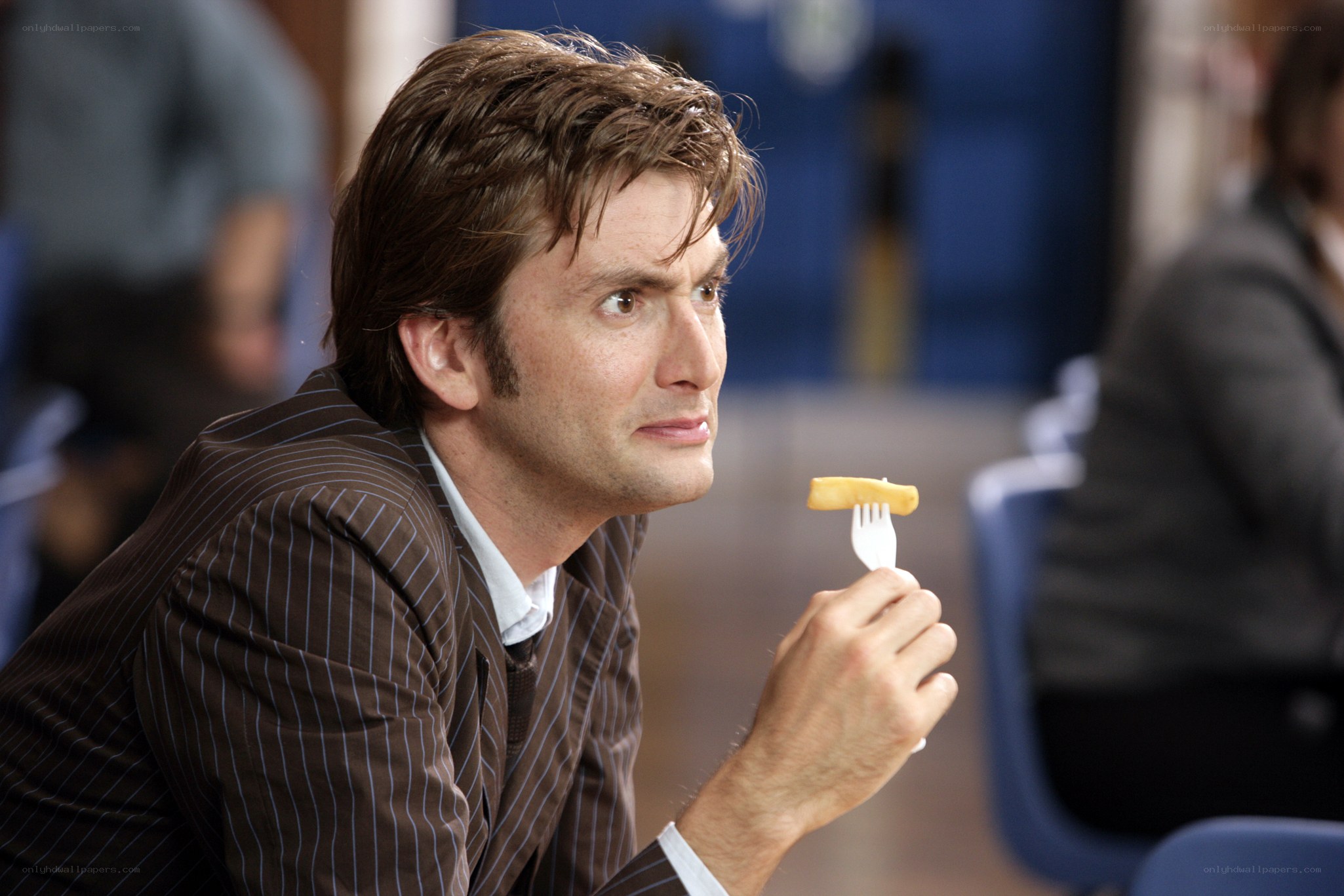 man eating a chip