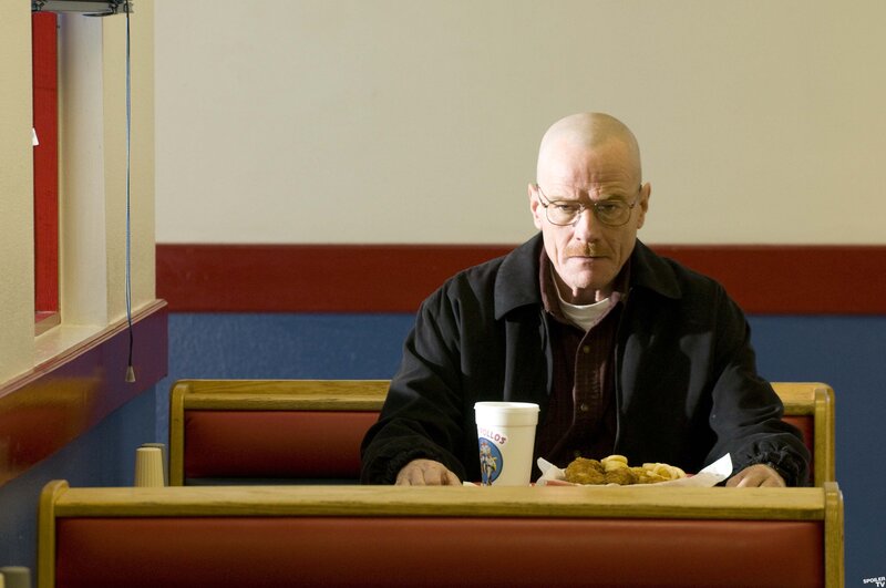 man eating at a diner
