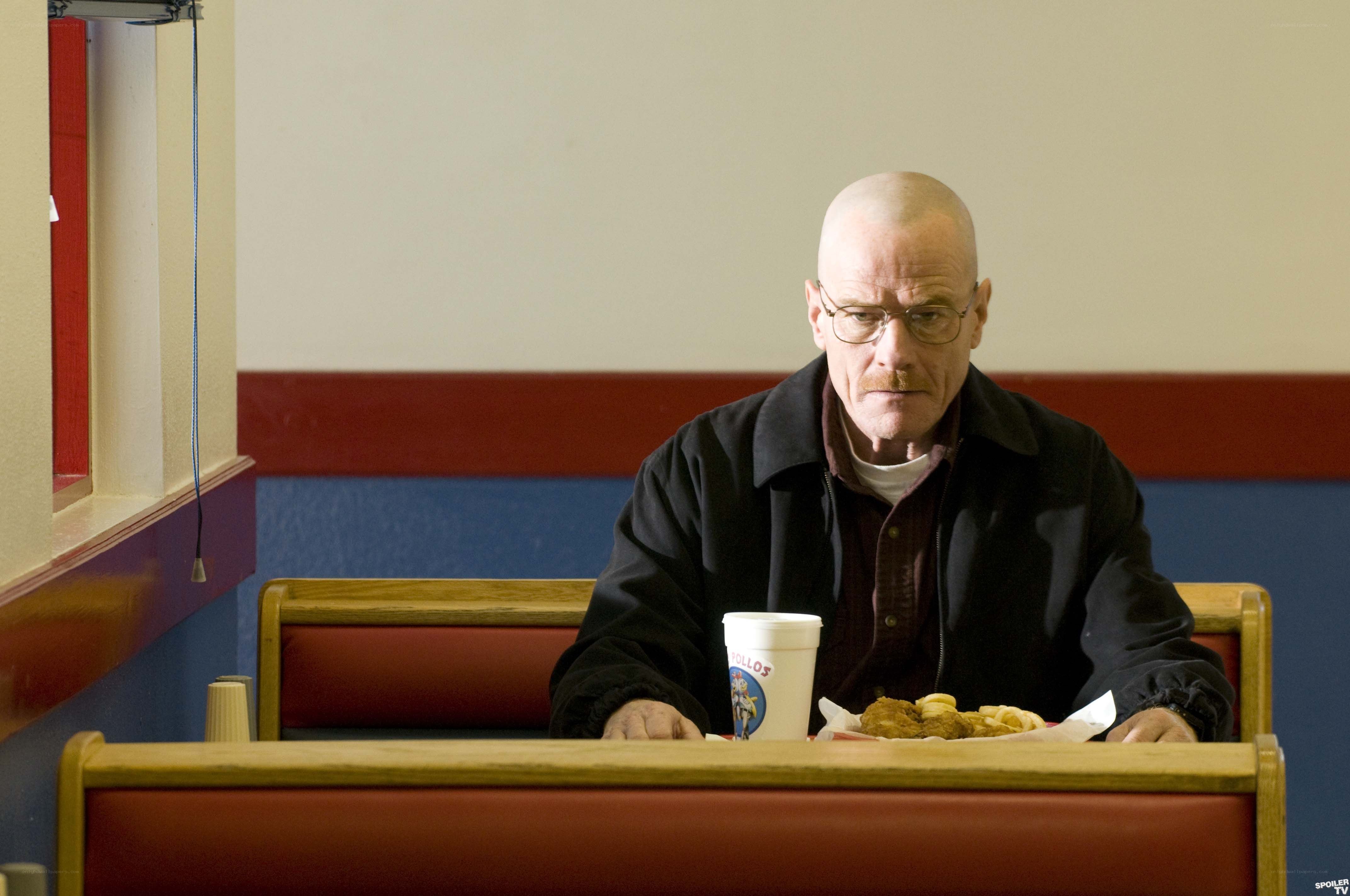 man eating at a diner