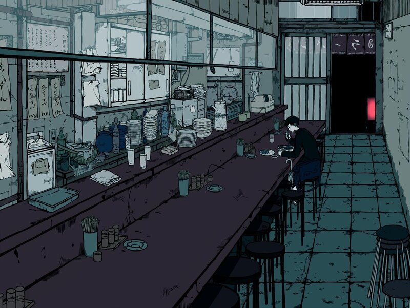 Man eating at a quiet bar