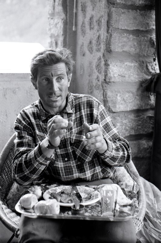 Man eating at a table