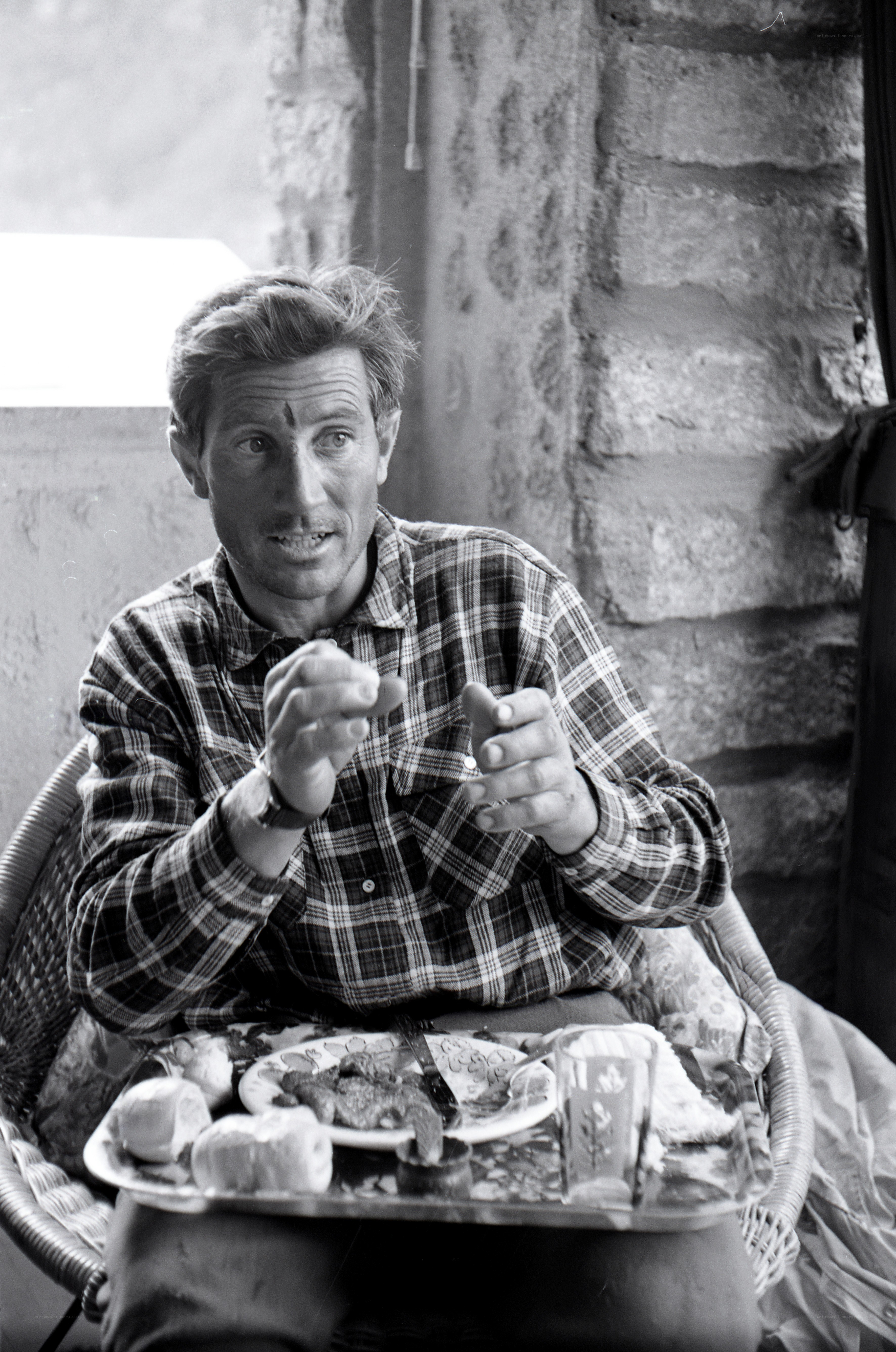 Man eating at a table