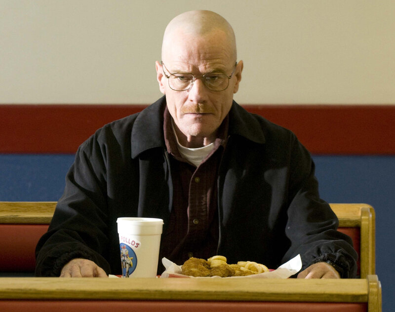 man eating fast food at a diner