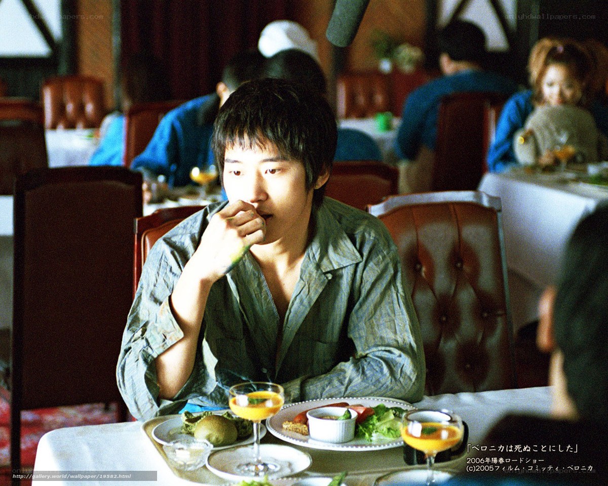 man eating in restaurant