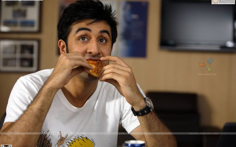 Man Eating Pizza
