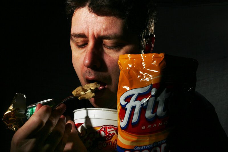 Man Eating Snacks