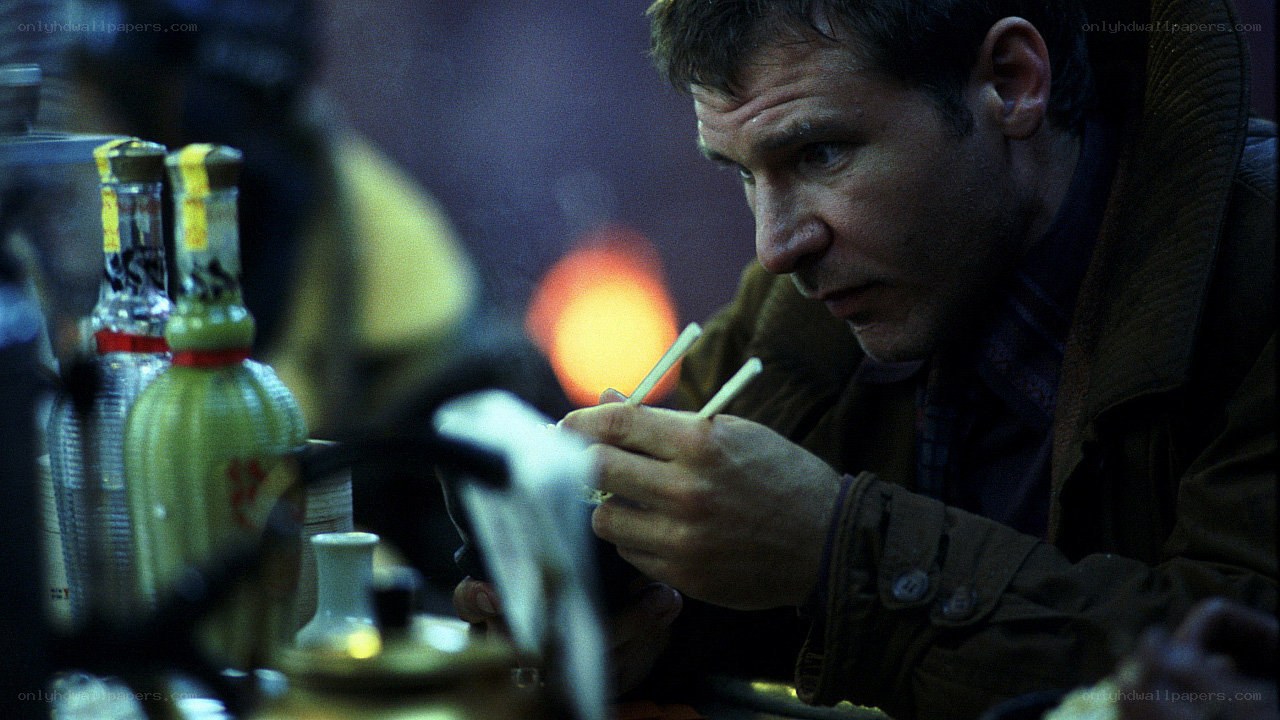 man eating with chopsticks
