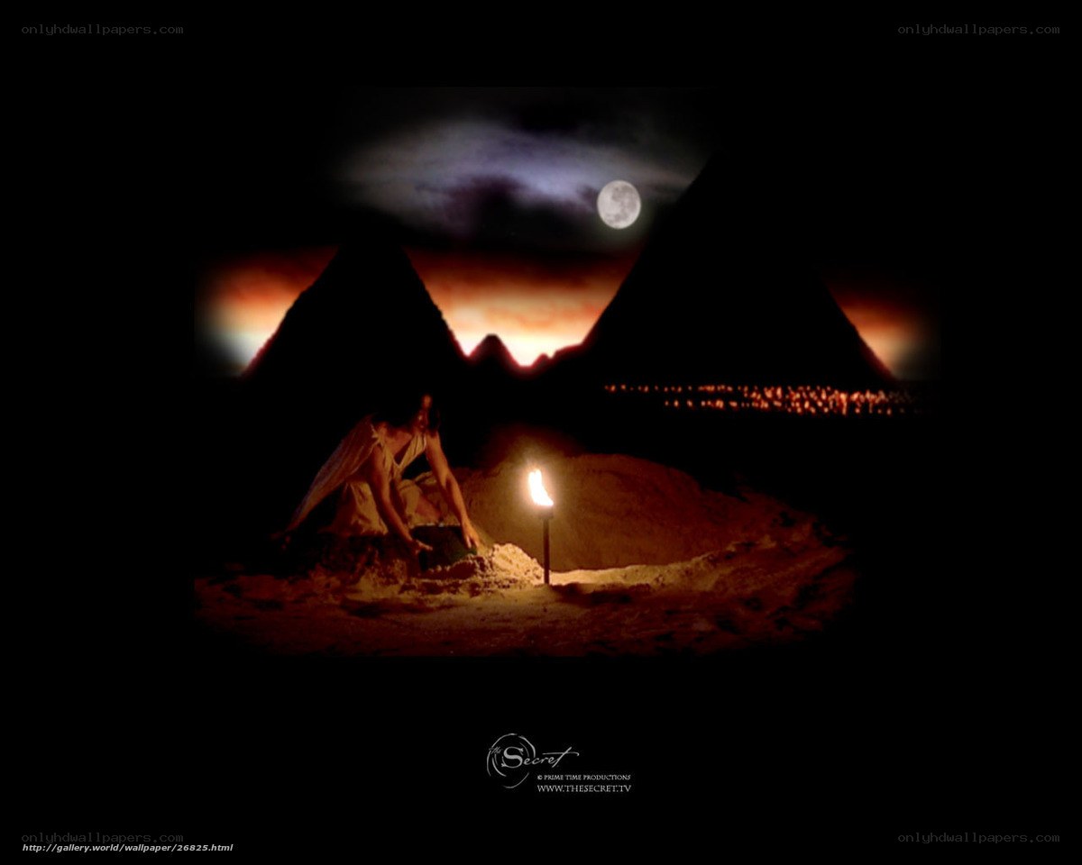 Man excavating near pyramids