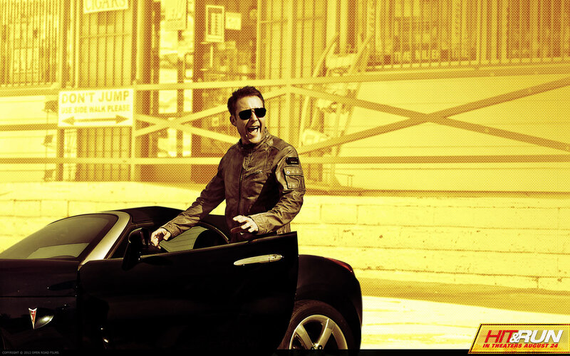 man exiting black car