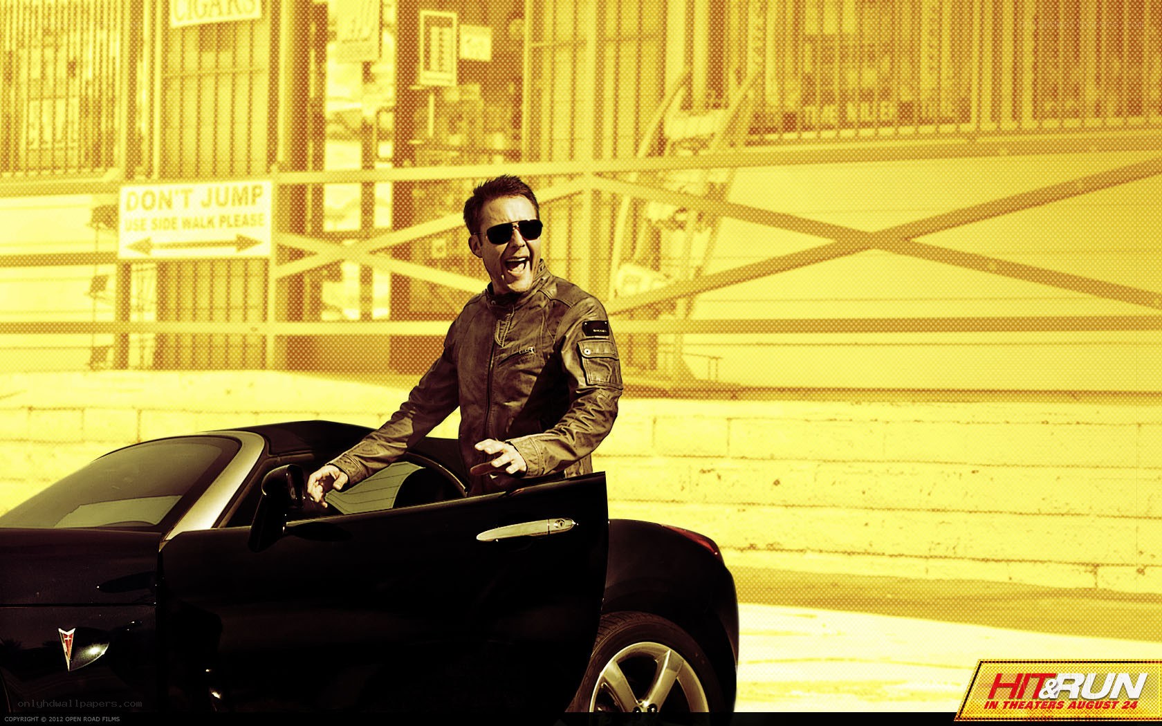 man exiting black car