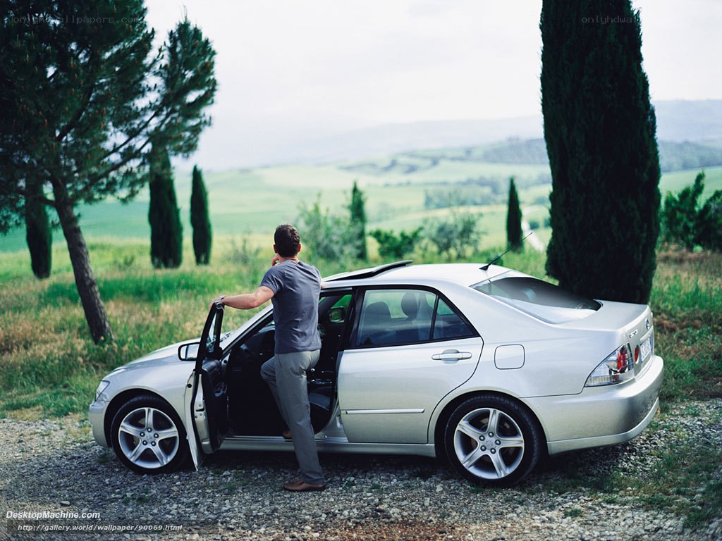 Man exiting car in countryside